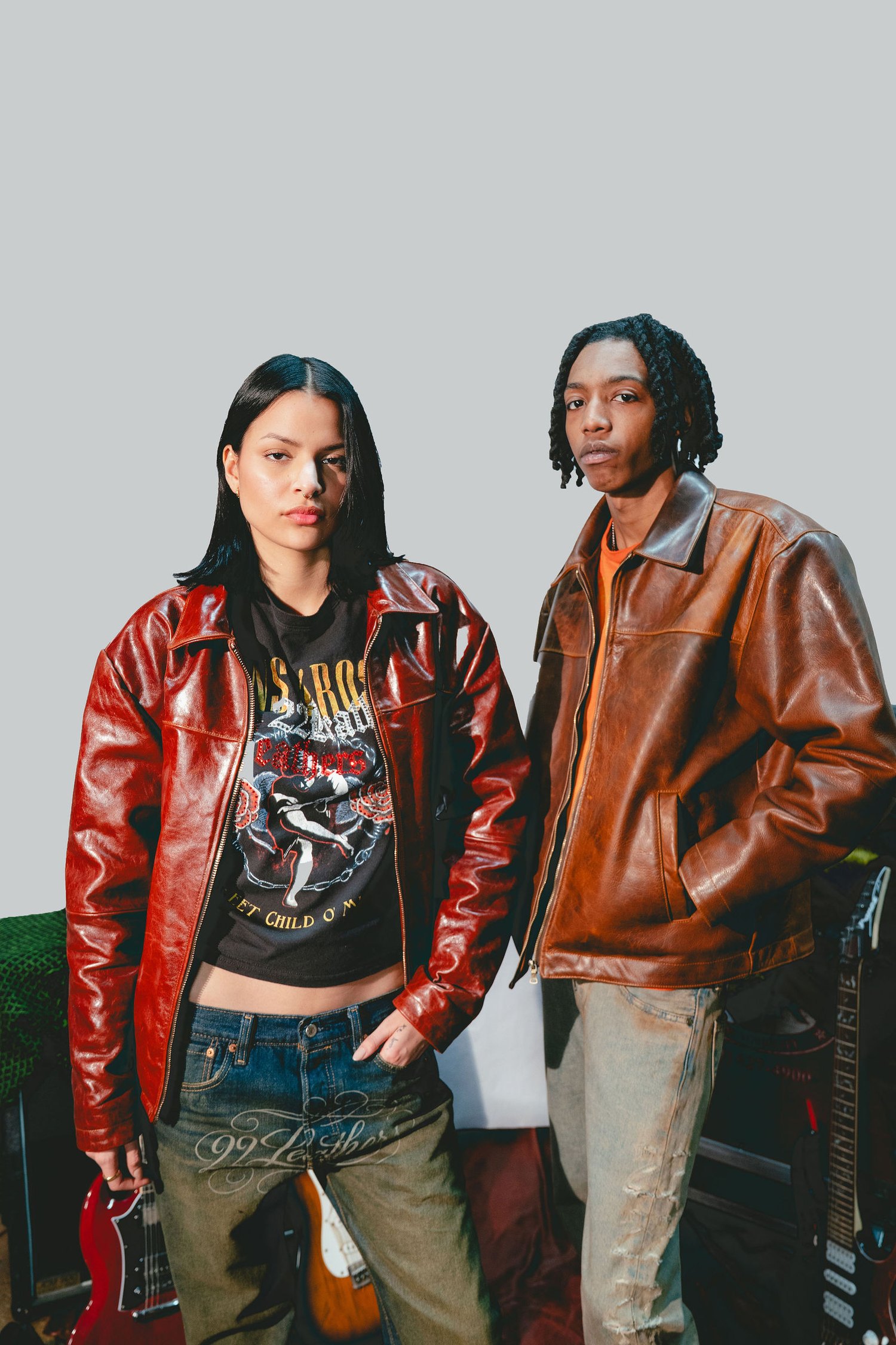 Two models in 22leathers oxblood and cognac leather jackets.