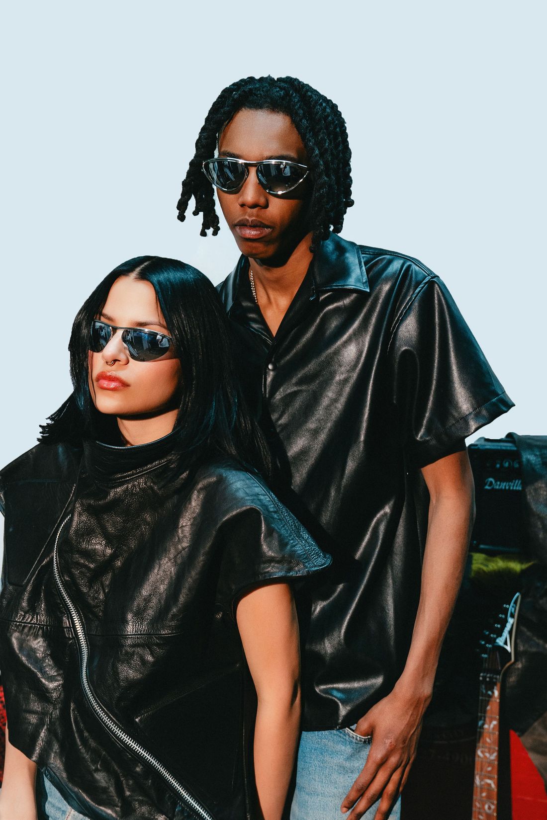 Black leather shirting, worn as a pair.