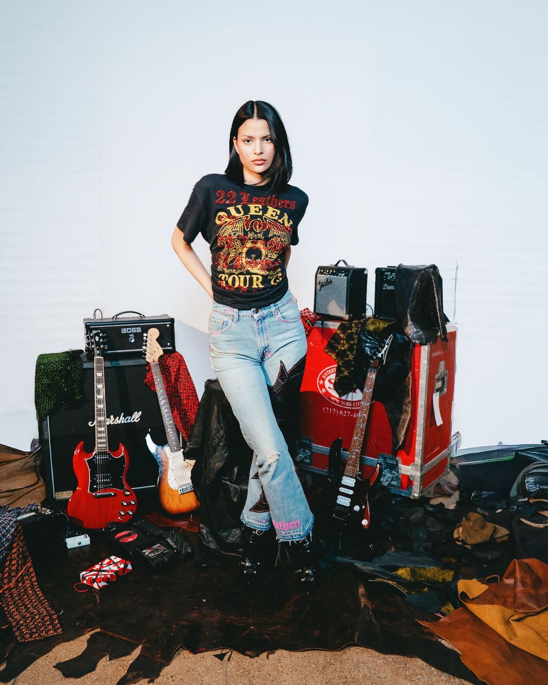 Reworked graphic tee with patched denim.